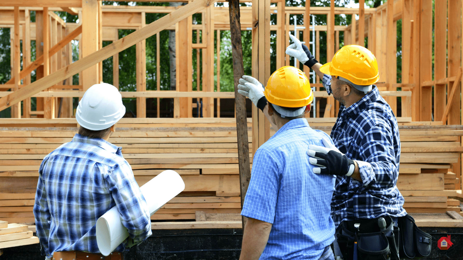 Contractor in front of house under construction 