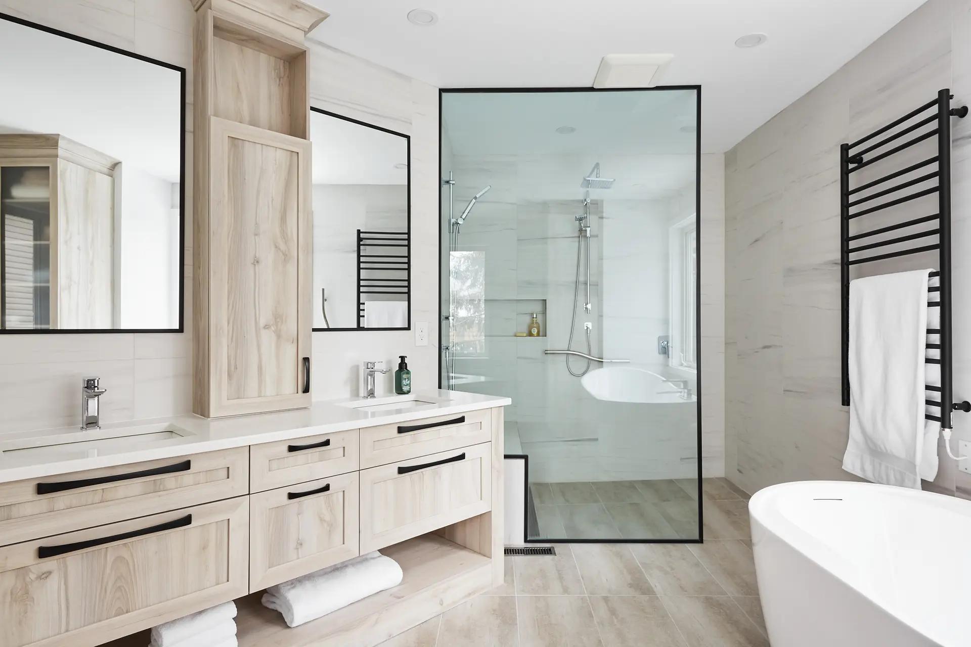 Spacious bright bathroom with a freestanding bathtub, a roomy walk-in shower, and a solid wood double vanity