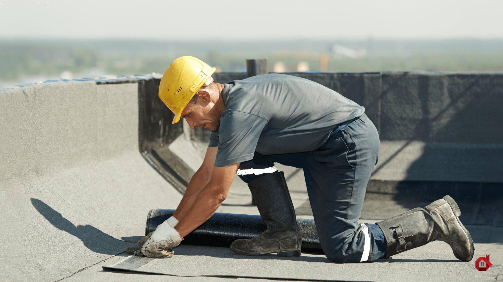 contractor installing a flat roof&nbsp;