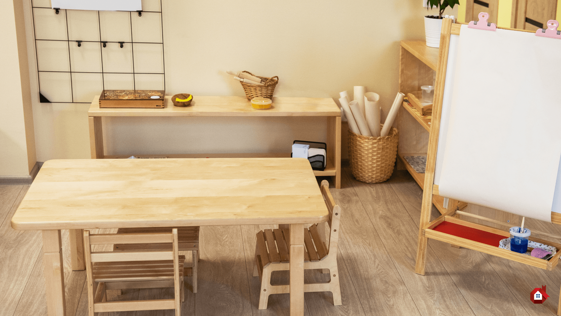 Montessori playroom with a low table, shelves, and an A-frame whiteboard