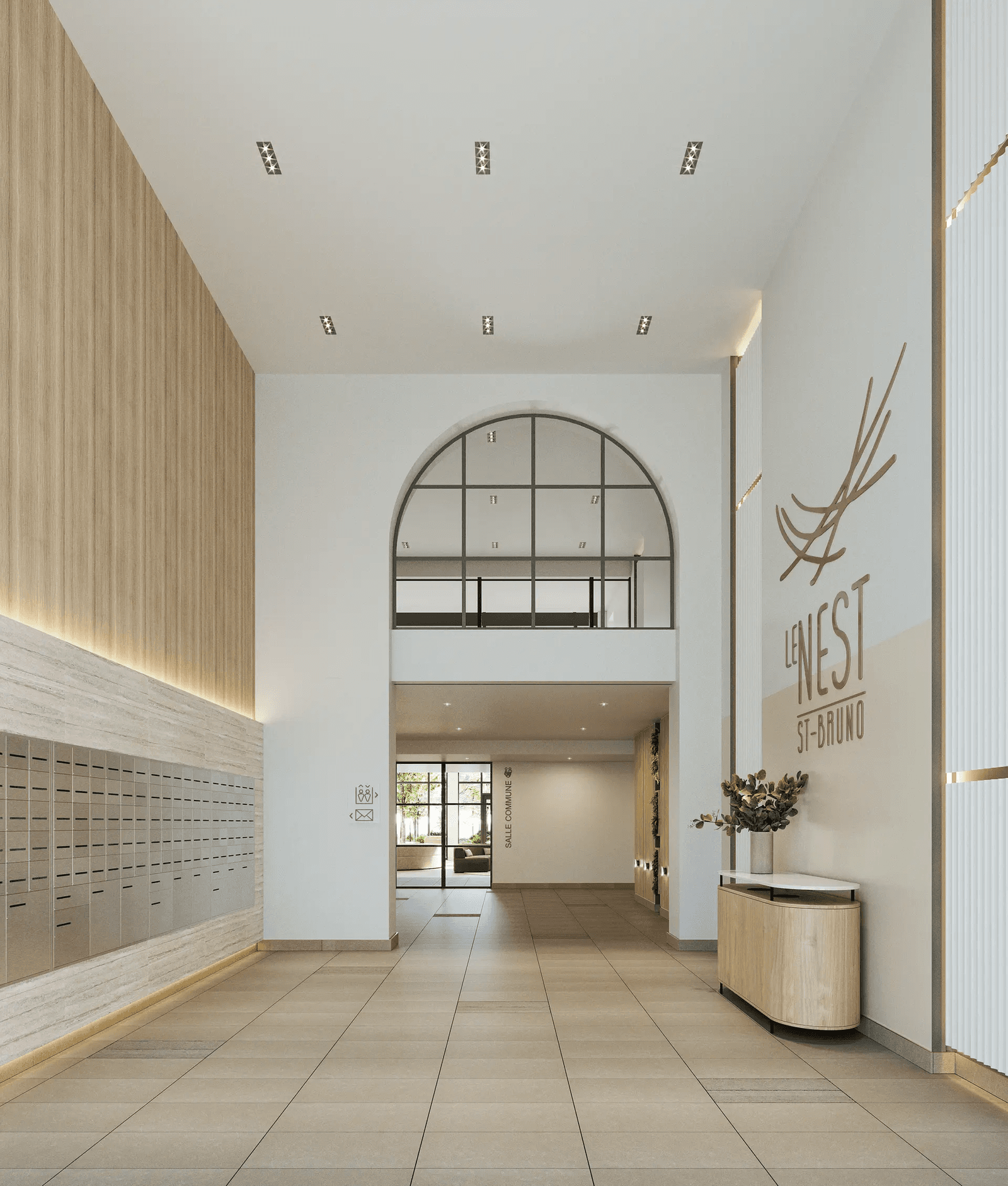 Modern residential building lobby with built-in mailboxes, recessed lighting, light wood finishes and a large arched glass opening