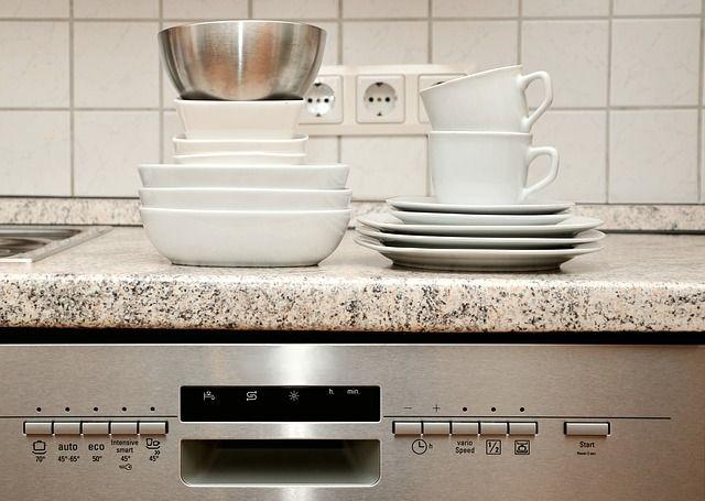 Dishwasher with dishes_8 Renovation Projects That Will Transform Your Old Home