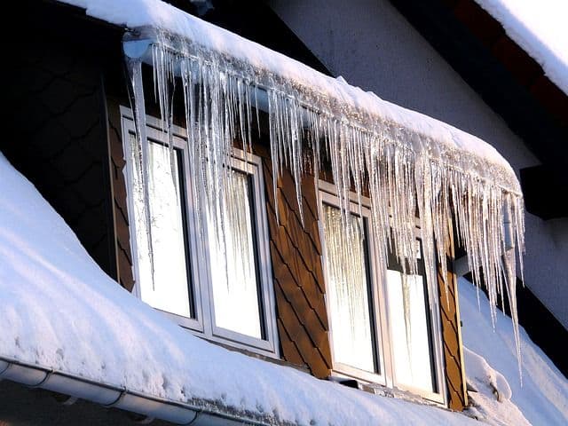 Ice hanging from house_insulation problem_RenoQuotes.com