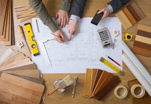 People working on house plan