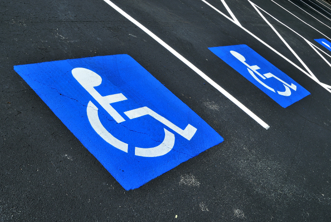 by-laws surrounding parking spaces for persons with reduced mobility
