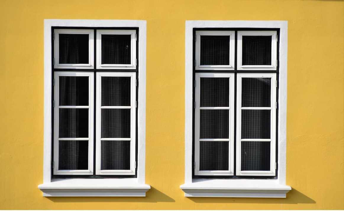 yellow wall with window_Erector Mechanic (Glazier): Ins and Outs of the Trade