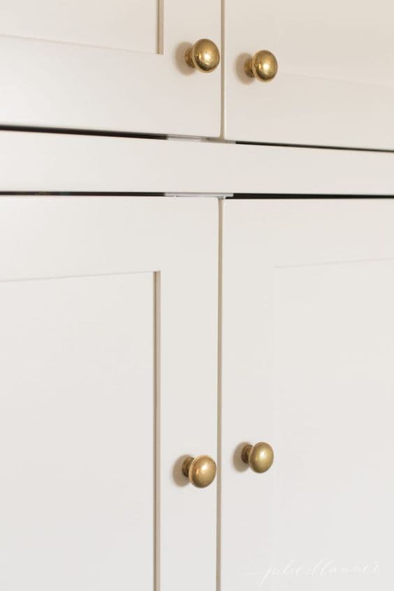 white kitchen cabinet handles and golden knobs_10 Kitchen Cabinet Handles